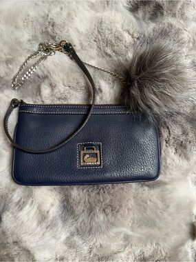 Dooney & Bourke Navy Pebbled Leather Wristlet with Fur Pom